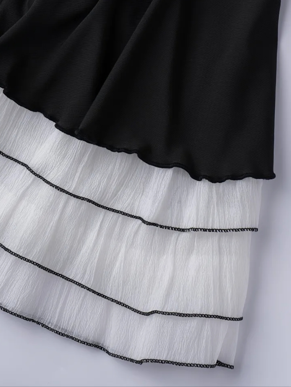 Elegant Black Maxi Dress with White Lace Straps - Picture 5 of 5